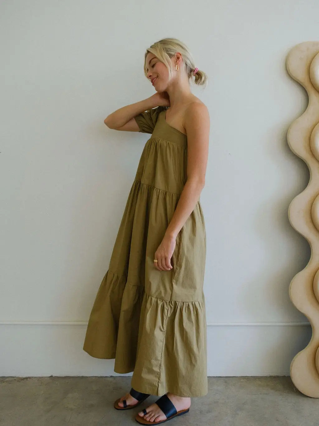 One shoulder khaki/green dress with pockets.